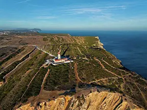 Aerial drone view of lighthouse on Cabo Espichel cape Espichel on Atlantic ocean