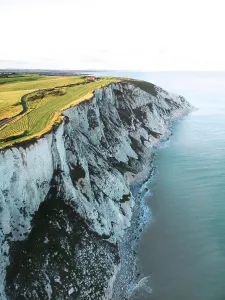 Aerial Prints: Aerial drone view of the Seven Sisters Cliffs National Park during sunset in the Eastbourne