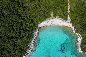 Exclusive Prints: Aerial of an isolated beach with turquoise waters in Greece
