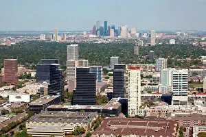 Aerial of the Uptown area with Downtown in the distance