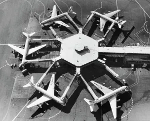 Commercial Airplane Prints: Aerial view of five airplanes at an airport