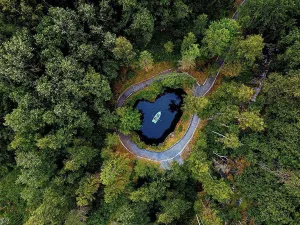 Footway Prints: Aerial view of boat at underground lake in Ruskeala Mountain Park