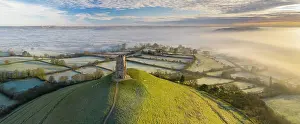Drone Point Of View Prints: Aerial view by drone of frosty winter morning at Glastonbury Tor