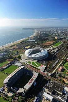 Zulu Kingdom Prints: Aerial view of Durban showing The Moses Mabhida and ABSA Stadiums and city in the background KwaZulu Natal