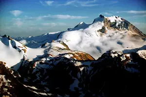 Alberta Prints: An aerial view of the glacier and snow capped Tantalus Range near Whistler British Columbia in Canada