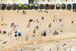 Victoria Prints: Aerial view of holiday makers and beach huts on Brighton beach