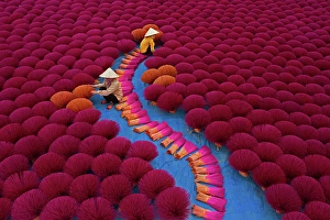 Vietnamese Prints: Aerial view of incense workers sits surrounded by thousands of incense sticks