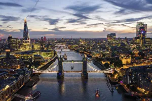 Thames Prints: Aerial view of London bridge crossing the river Thames at sunset, United Kingdom
