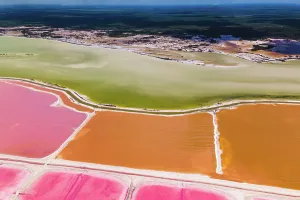 Swamp Prints: Aerial view of pink salt lakes along the coast at Ria Largatos Natural Park