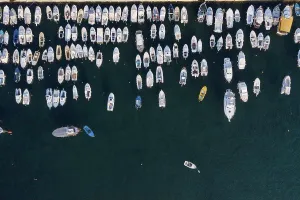 Drift Prints: Aerial view of rows of moored motorboats