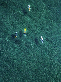 Bird´´s Eye View Prints: Aerial view of surfers swimming in turquoise waters of Arabian Sea