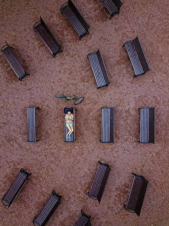 Unwind Prints: Aerial view of woman using smart phone while lying on bench in park