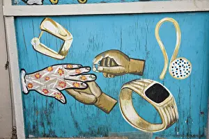 Paint Prints: Africa, West Africa, Ghana, Kumasi. Hand-painted sign for local jeweler