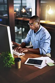 Keyboard Prints: African, businessman and typing on tech at night in research as corporate communication specialist