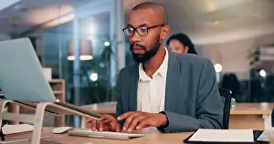 Deadline Prints: African man, computer and typing at office