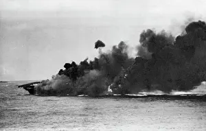 Newspaper Prints: Aircraft Carrier Survives 'One-Two' Punch -- Hit and set aflame by Jap suiced planes