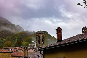 Autumnal Prints: Alpine Village Bre with Autumn Forest and Mountain in a Cloudy Day in Monte Bre