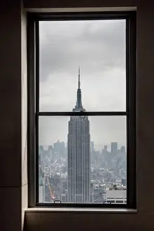 Financial Prints: Amazing view from window on Empire State building in New York and cloudy sky