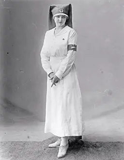Early 1900s People Prints: American Red Cross uniform modeled by a Red Cross nurse. ca. between 1910 and 1920