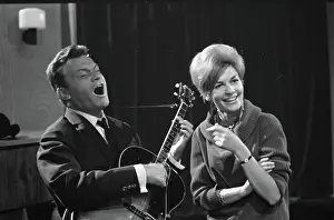 February Prints: Anefo photo collection. Danish-French Chansonnier Comedian Georges Ulmer in TV (AVRO) 'Club Domino'