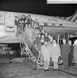 Norway Prints: Anefo photo collection. DWS team poses on plane stairs from KLM device