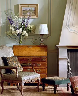 Pastel Prints: Armchair in front of antique bureau