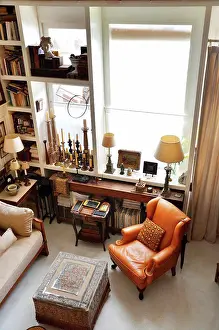 Flooring Prints: Armchair by window in living room, Argentina. 02/17/2011