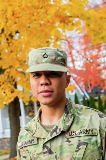 Drinking Age Prints: Army private in fatigues in the autumn