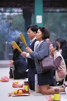 Prayer Prints: Asia, China, Hong Kong. Taoist worshippers at Wong Tai Sin Temple in Kowloon