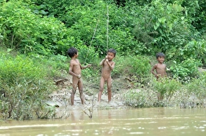 Asia, Southeast Asia, Vietnam, Souther Highlands, Kontum, Konkotu, nude children playing next to the river