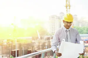 Aufstellungsort Prints: Asian Indian male site contractor engineer inspecting at site Asian Indian male site contractor engineer with hard hat