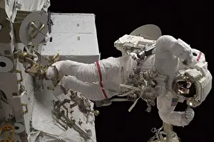 Maintenance Prints: Astronaut participates in a session of extravehicular activity (EVA)