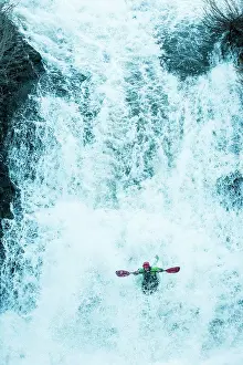 Thrill Prints: Athletic man kayaking white water