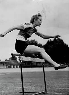 1952 Prints: Australian Girl Hurdles To Helsinki Via London -- Miss Shirley Strickland (Western Australia)