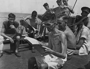1945 Prints: Many Australian prisoners released from Amboina were too weak to walk