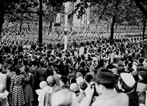 Coats Prints: Australian troops seen marching in the Procession along the Mall watched with great interest by the huge crowds