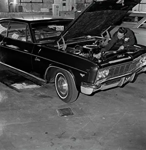 Skilled Prints: Auto mechanic at work