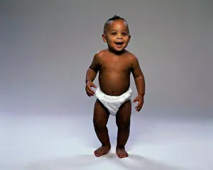 Beginnings Prints: Baby boy trying to walk