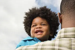 Shoulder Prints: Baby being carried by father