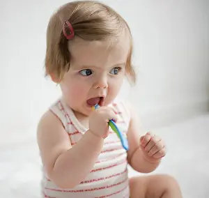 Tooth Prints: Baby Lilli brushes teeth