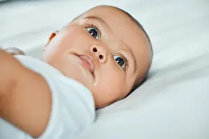 Family Home Prints: Baby, relax and thinking on bed in morning for health