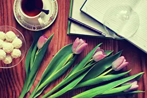 2016 Prints: background wooden with tulip and tea background wooden with tulip and tea