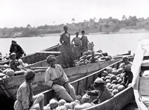 Medium Group Of People Prints: Baghdad, Iraq: 1932 Iraqi boys with barges of watermelons on the Tigris River