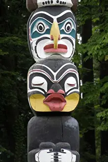 Carved Prints: Bak a wild man and Dzunukwa a giantess shown on Kwakwaka totem pole carved by Ellen Neel Mungo Martin in 1955 Stanley