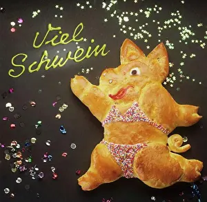 Inscription Prints: Baked pig (bread dough), the words Viel Schwein (New Year wish)