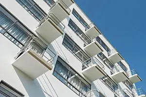 Balcony Prints: Balconies on the facade of the Bauhaus Dessau with blue sky and sunshine