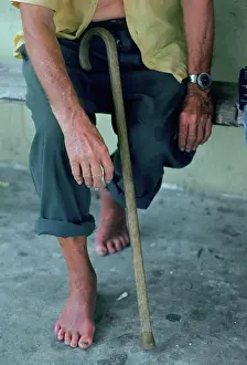 Swamp Prints: The barefeet of an elderly man