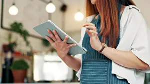 Cafe Prints: Barista, tablet and hands of woman in cafe for research