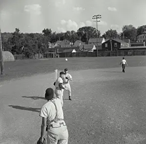 Baseball Cap Prints: Three baseball players playing in a baseball field