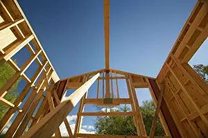 Construction Equipment Prints: Beam of a home under construction during framing process in Southern California